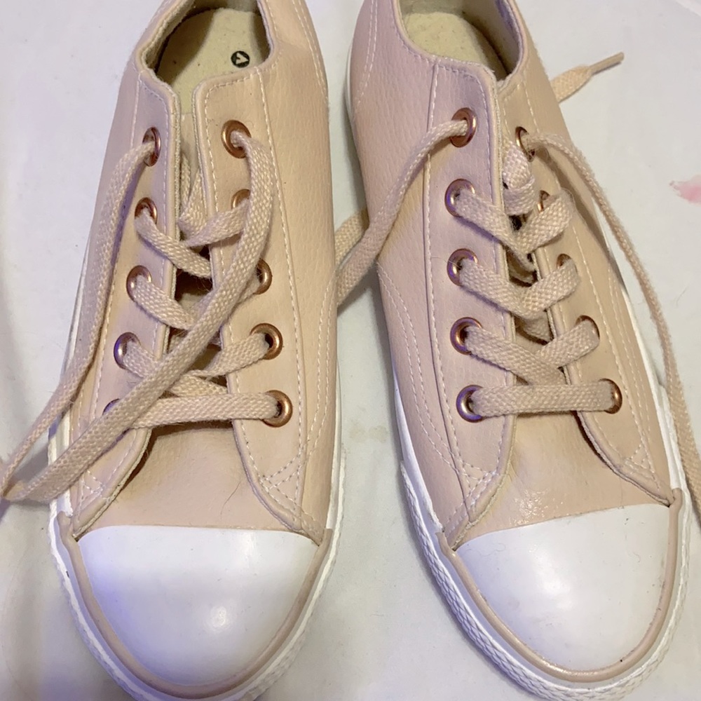 Cream colored shoes. Size 7. Never used.